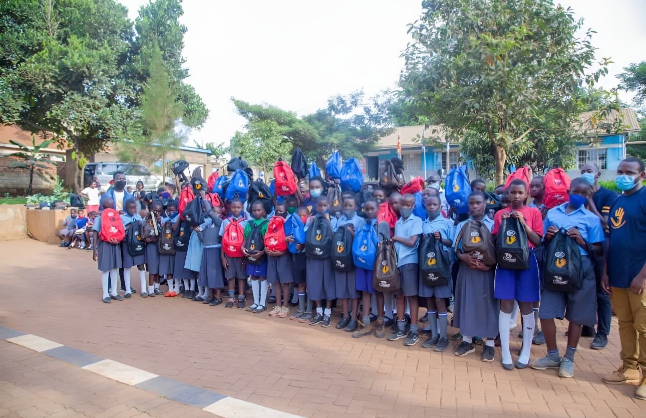 91 students of Namugoona Kigobe Primary School receive scholastic materials, 5 students receive tuition fees for one semester .